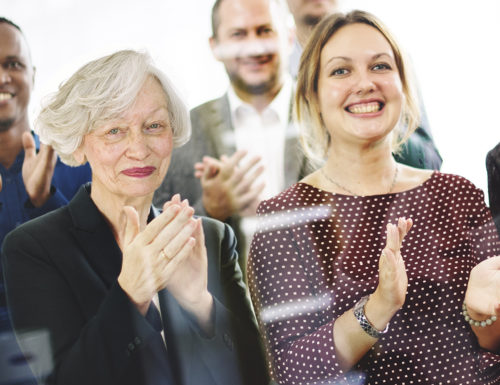 Business People Team Applauding Achievement Concept